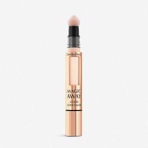 Achieve flawless, natural-looking with Charlotte Tilbury's Magic Away Concealer in Shade 2, designed to diminish imperfections for a radiant complexion.